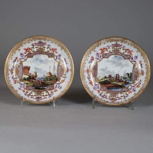 Pair of Meissen saucers with watery landscapes