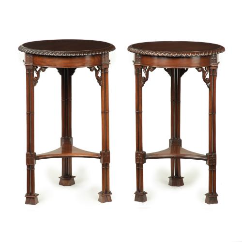mahogany circular occasional tables in the Chippendale taste