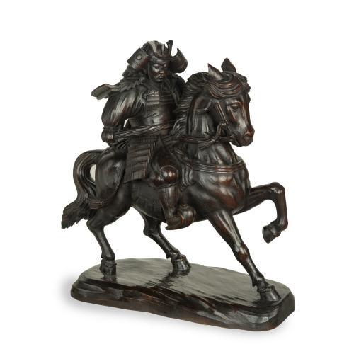 Japanese equestrian wood carving of a samurai