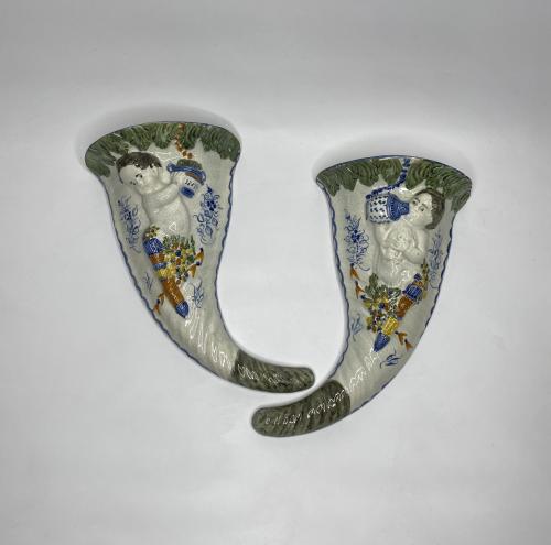 Pair Prattware Cupid pottery wall pockets, circa 1810
