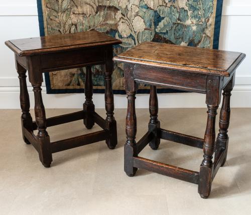 An uncommon pair of Charles II oak joint stools, circa 1670