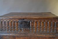 A Charles I oak boarded box with later stand